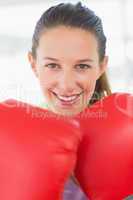 Closeup portrait of a smiling female boxer