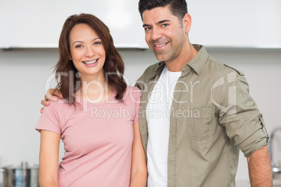 Portrait of a smiling couple in the kitchen