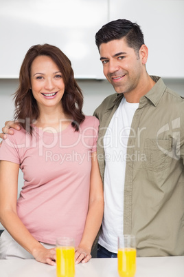 Portrait of a smiling couple in the kitchen
