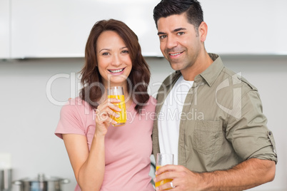 Portrait of a smiling couple in the kitchen