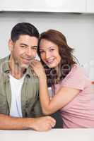 Portrait of a smiling couple in kitchen