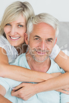 Portrait of a loving mature couple in bed