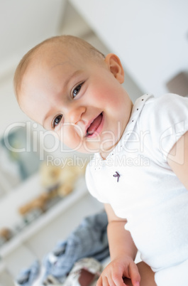 Closeup portrait of a cheerful cute baby