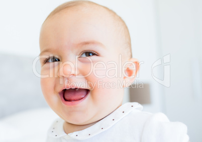 Closeup portrait of a smiling cute baby