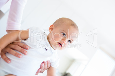 Closeup of smiling cute baby at home