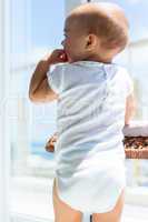 Rear view of a cute baby