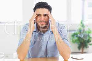 businessman suffering from headache