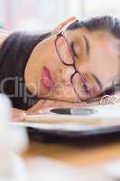 Closeup of businesswoman sleeping on desk
