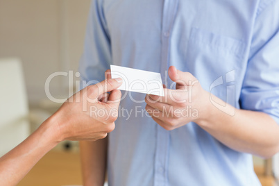 Business people exchanging visiting cards