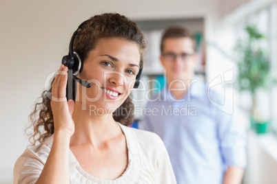 Female customer service representative wearing headset