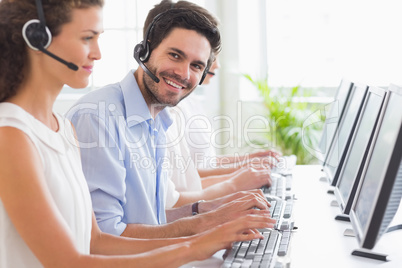 Customer service representative working with colleagues