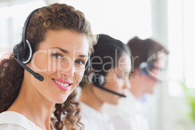 Beautiful businesswoman wearing headset