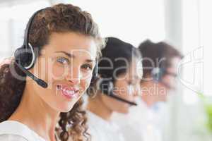 Beautiful businesswoman wearing headset