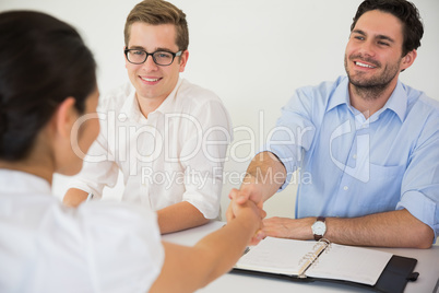 Business people greeting in meeting