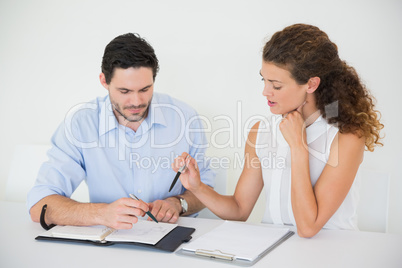 Business people discussing at desk