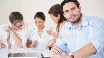 Confident businessman in meeting room