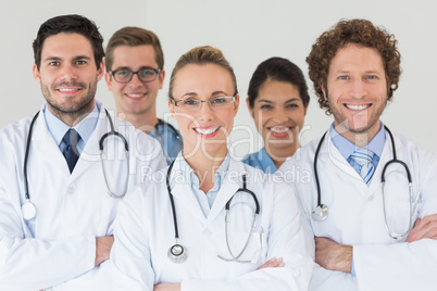 Happy nurses and doctors in hospital