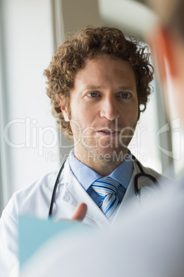 Doctor discussing with colleague