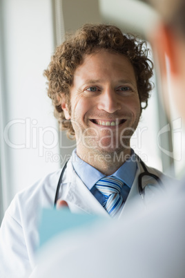 Doctor looking at colleague