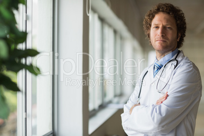 Confident doctor standing arms crossed Confident doctor standing arms crossed