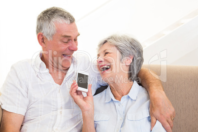 Couple using smartphone