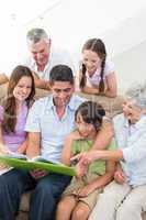 Happy family reading book