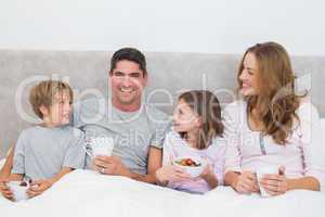 Man with family having breakfast