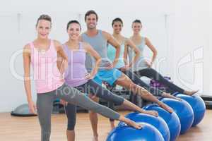 Fitness class with exercise balls at fitness studio