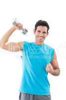 Portrait of a smiling man exercising with dumbbell