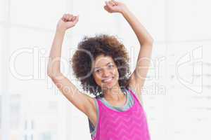 Portrait of a smiling sporty young woman