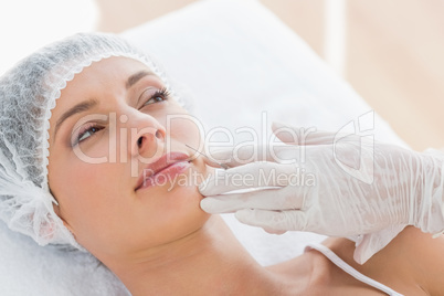 Woman recieving botox injection