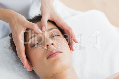 Beautiful woman having head massage