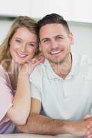 Smiling couple in kitchen