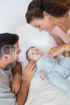 Caring parents with baby boy