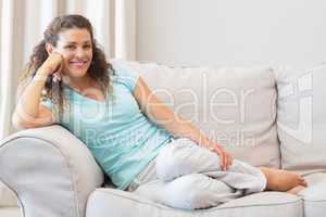 Beautiful woman relaxing on sofa