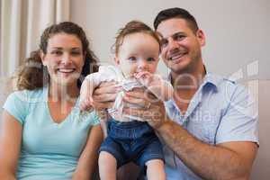 Happy parents with cute baby boy