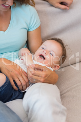 Mother holding baby boy