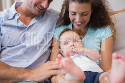 Parents looking at cute baby