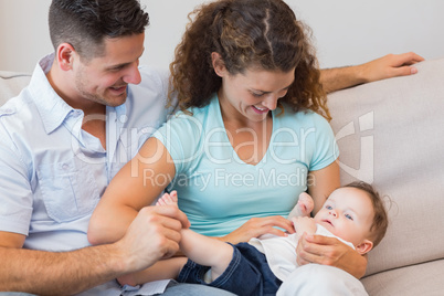 Parents playing with baby boy