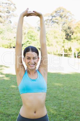 Woman stretching at park