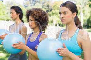 Women exercising with medicine balls
