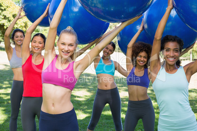 Group of women exercising with fitness balls