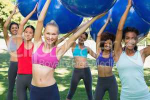 Group of women exercising with fitness balls