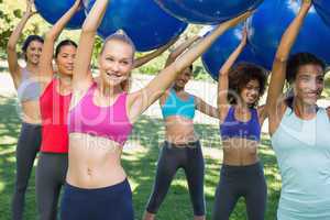 Group of women exercising in park