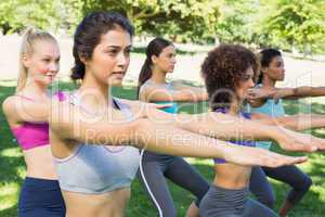 Sporty women doing stretching exercise