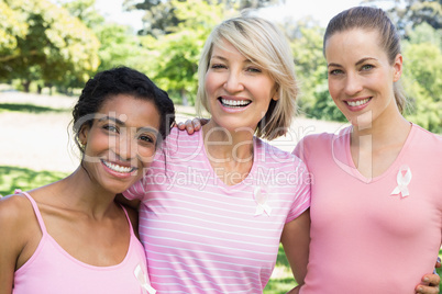 Multiethnic volunteers participating in breast cancer awareness
