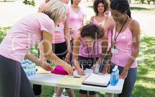 Participants registering for breast cancer campaign