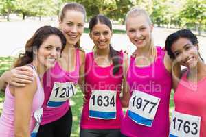 Confident female participants of breast cancer marathon