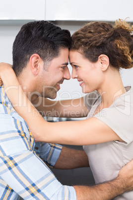 Romantic smiling couple hugging