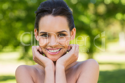 Close-up portrait of beautiful woman in park
